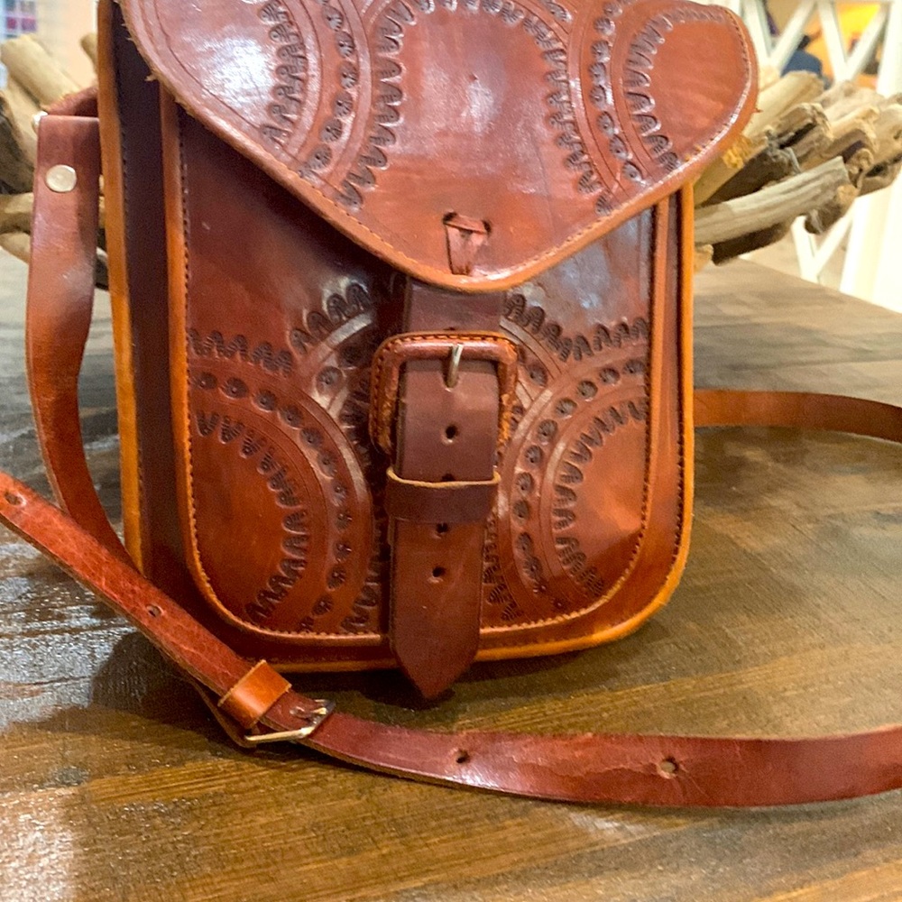Vintage cowhide handmade embossed leather saddle bag, exclusive design